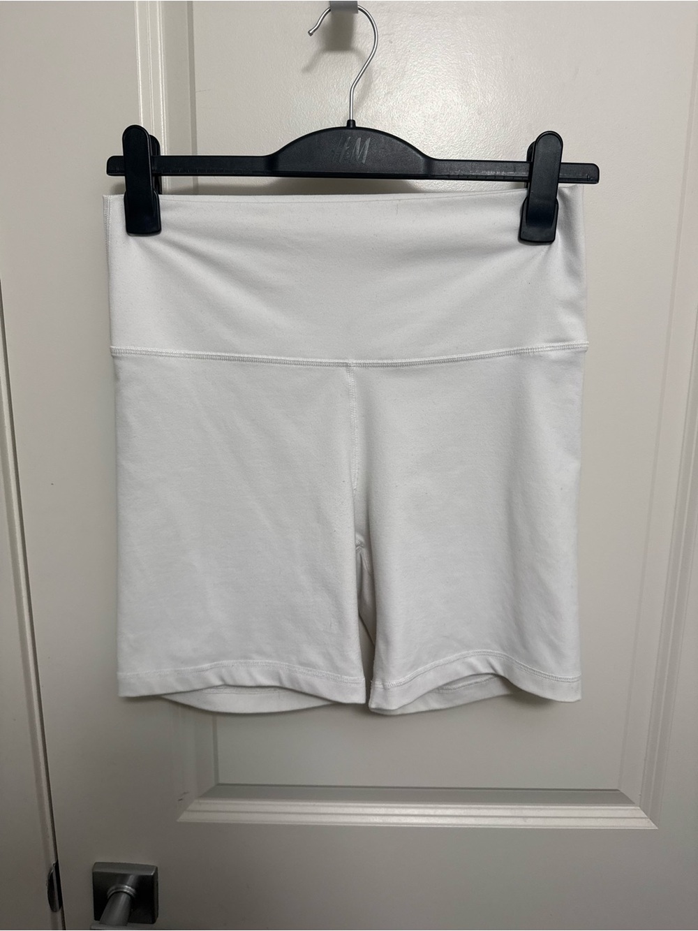 Aritzia TnAction white high-rise bike shorts in size L